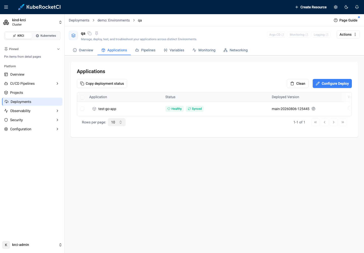 KubeRocketCI Portal environment Applications tab showing the test-go-app application deployed and healthy on the vcluster